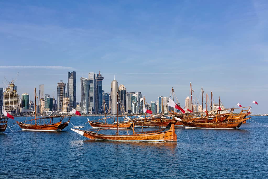 The Flag of Qatar is flown prominently in many public places, including on boats.