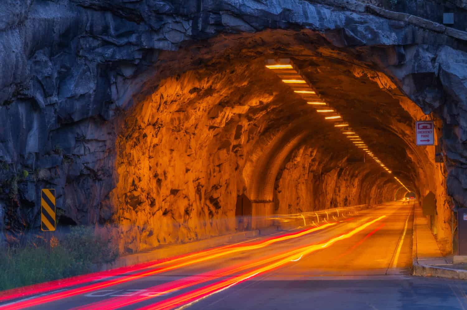 Cars pass through the Wawona Tunnel in Yosemite National Park, California