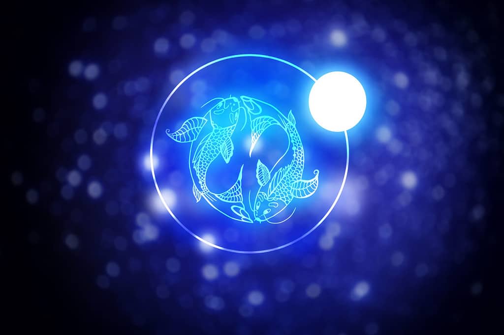 Astrology sign Pisces against starry sky