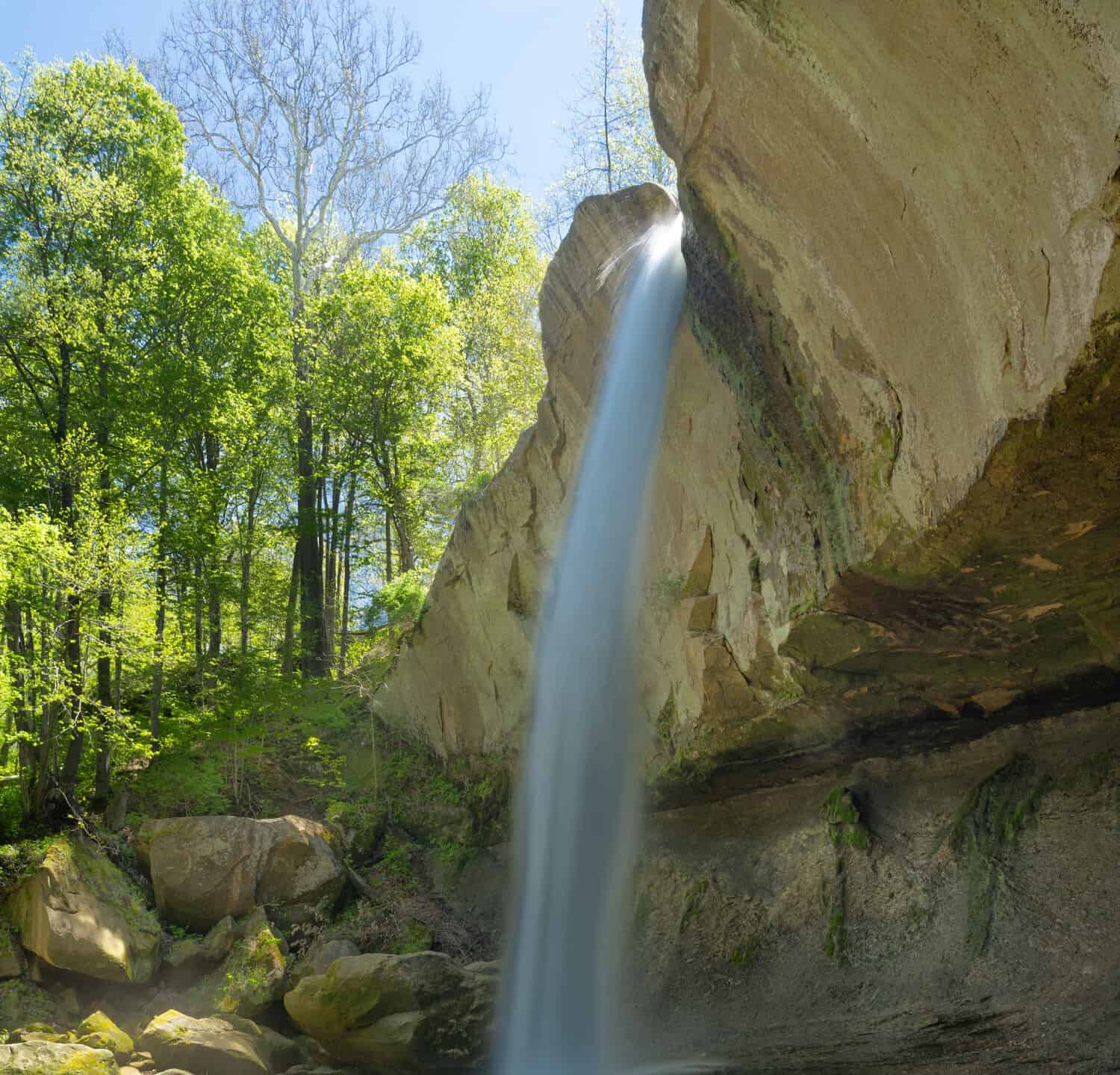 The plunging Williamsport Falls with a height of 90 feet cuts through a narrow spout in the sandstone edge.