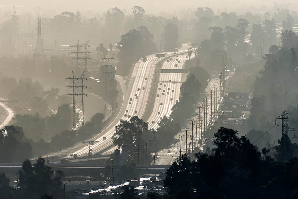 Hazy smoggy view of the 5 freeway near Riverside Drive, Griffith Park and the Los Angeles River in Southern California.