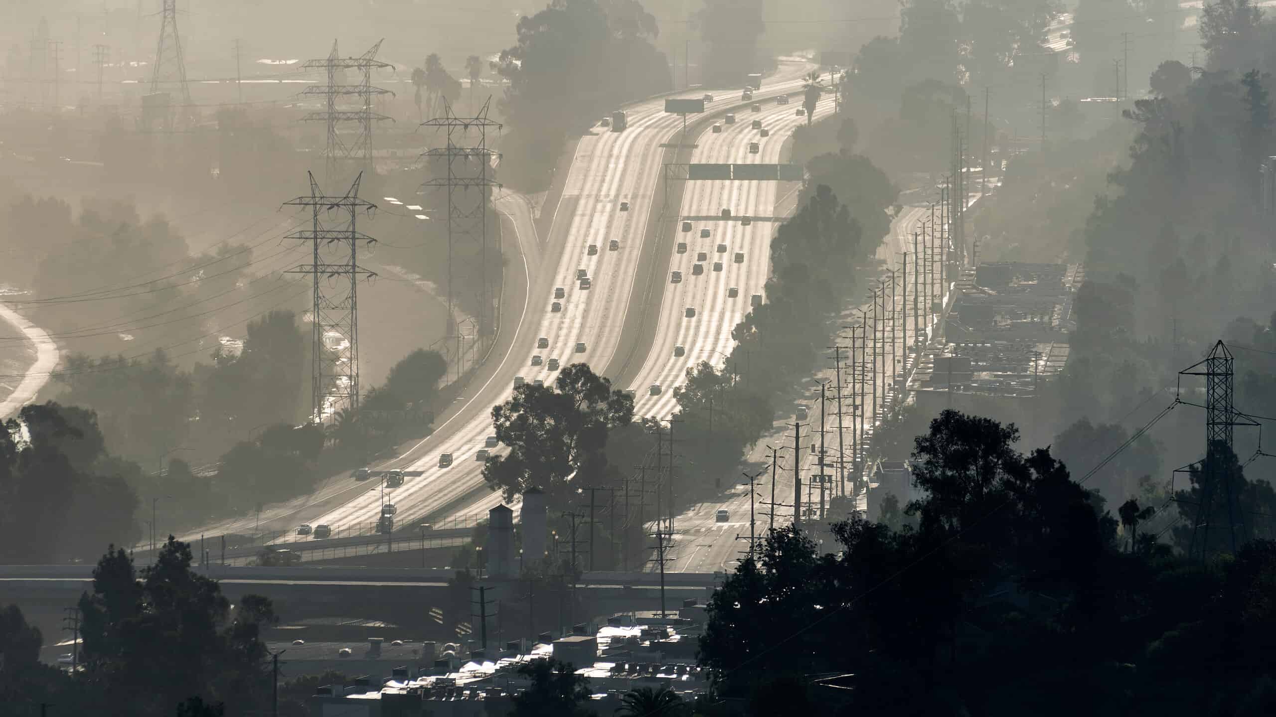 Hazy smoggy view of the 5 freeway near Riverside Drive, Griffith Park and the Los Angeles River in Southern California.