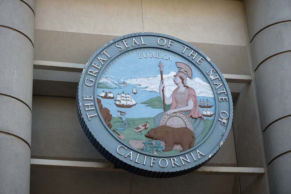 Great Seal of the State of California over building