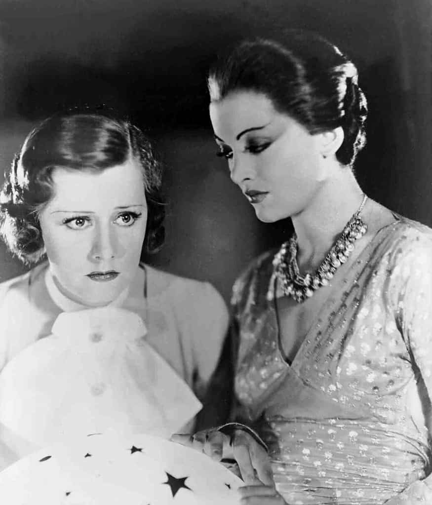 Irene Dunne and Myrna Loy in a promotional still for the film "Thirteen Women" (1932)