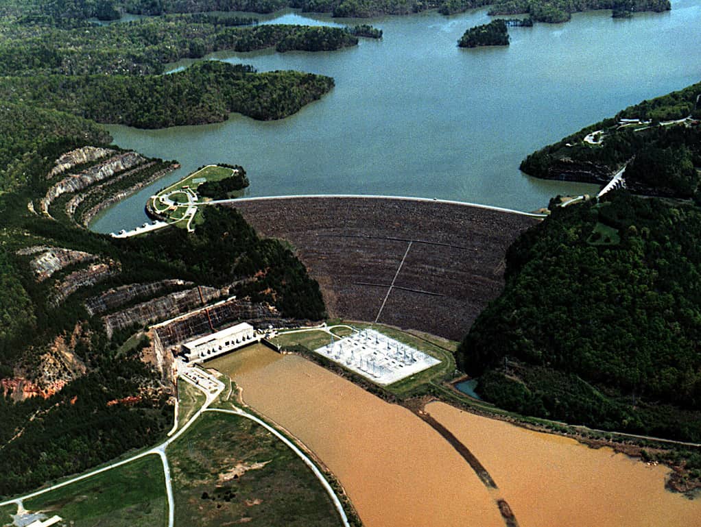 The U.S. Army Corps of Engineers constructed the dam in 1977 for flood control and hydroelectric power generation. The dam impounds Carters Lake in the mountains of northwestern Georgia.