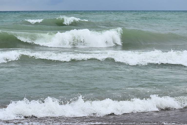 large waves on Lake Michigan, summer New Buffalo, Michigan USA