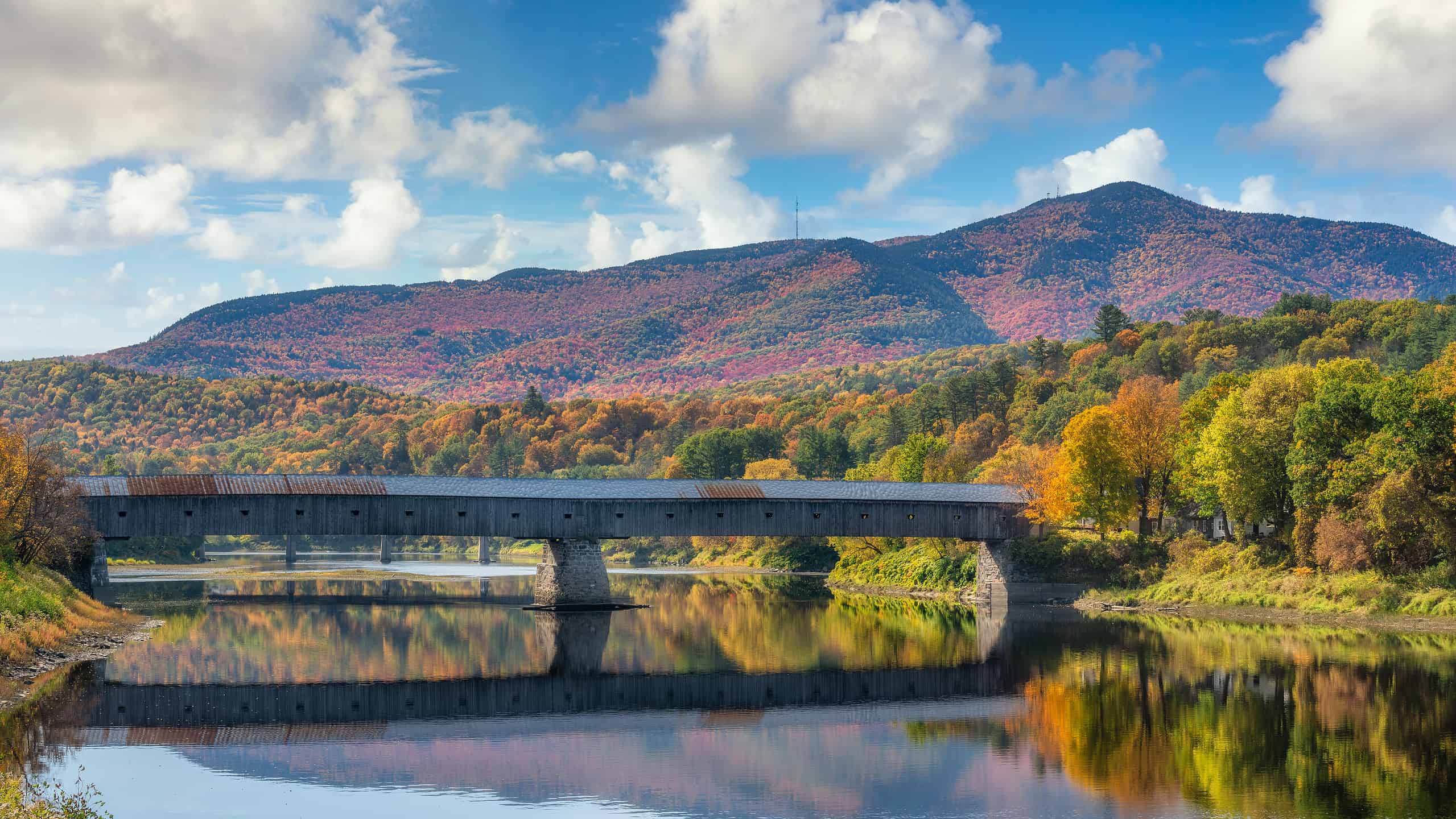 Autumn view of Cornish-Windsor Covered Bridge - longest in New Hampshire and Vermont on the Connecticut River
