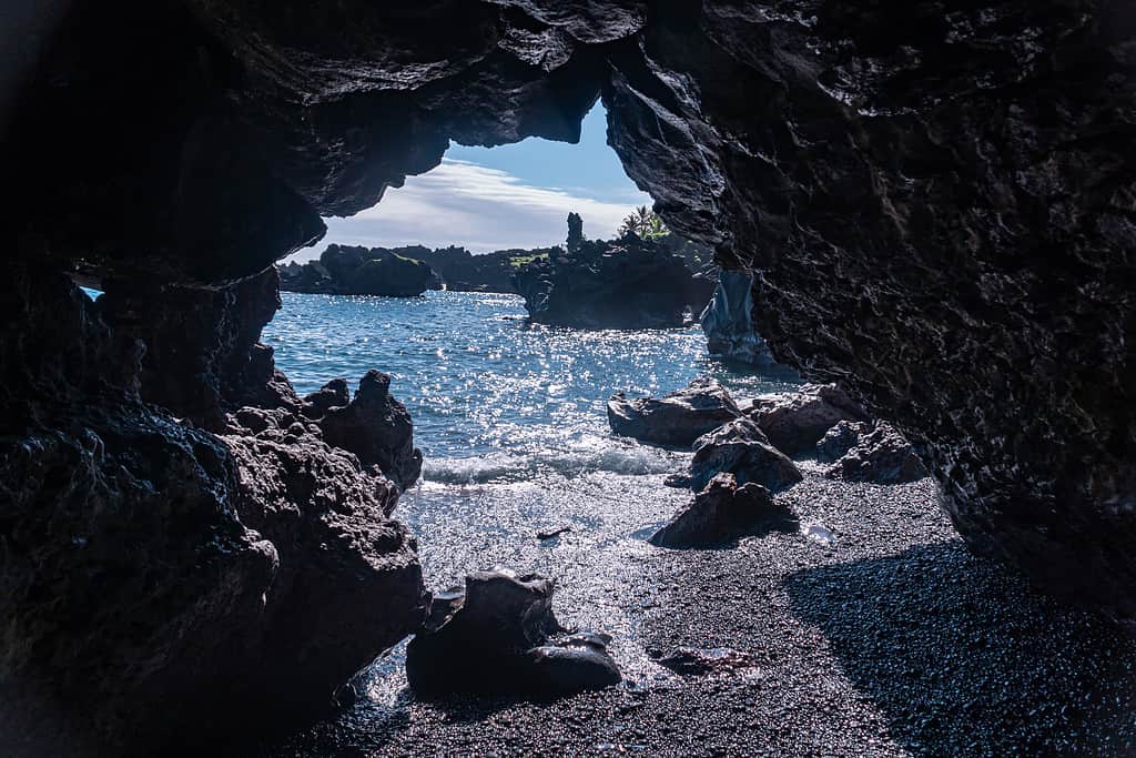 Sea Cave View of the Black Sand Beach at Waiʻānapanapa State Park in Hawaii