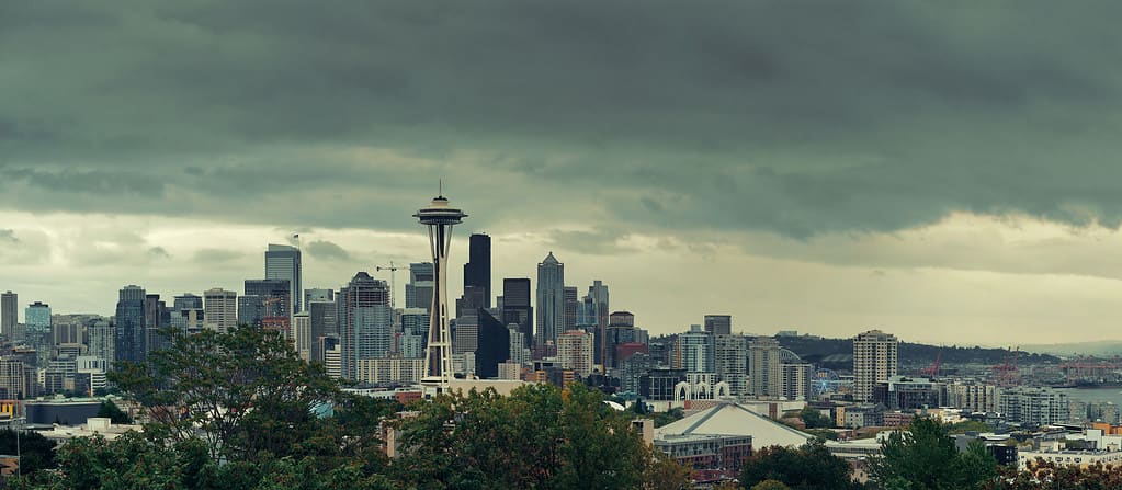 Space Needle and Seattle downtown skyline panorama from Kerry Park on a cloudy day.