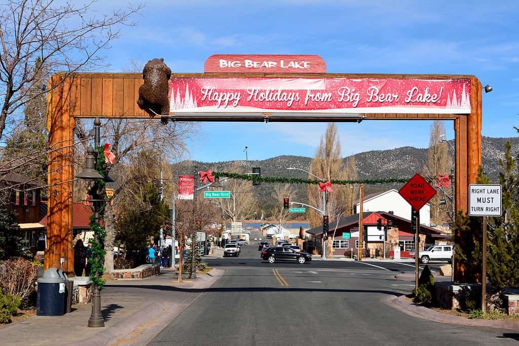 Big Bear Lake, California, United States of America - December 2, 2017. View of main street, Pine Knot Avenue, in Big Bear Lake, with season decorations, buildings and cars.