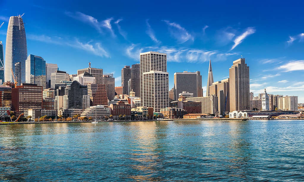 Downtown San Francisco and bay area on sunny day- this is one of the 40 cities that could be underwater by 2050.