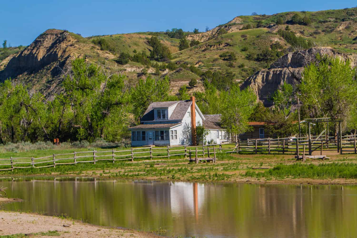 Ranch house and pond in Teddy Rosevelt National Park, North Dakota