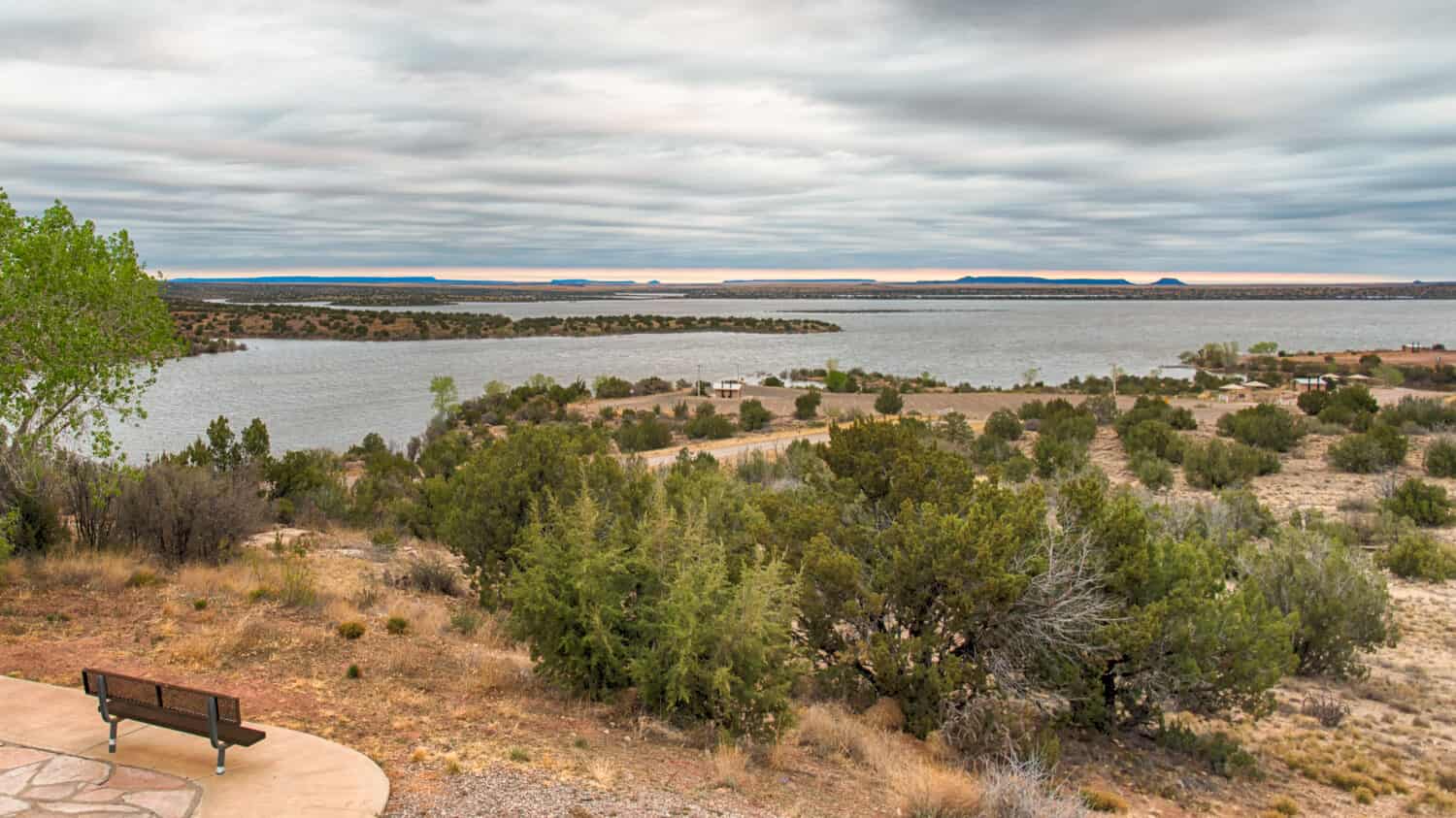A peaceful rest spot overlooking Santa Rosa Lake, at Santa Rosa Lake State Park, in New Mexico.