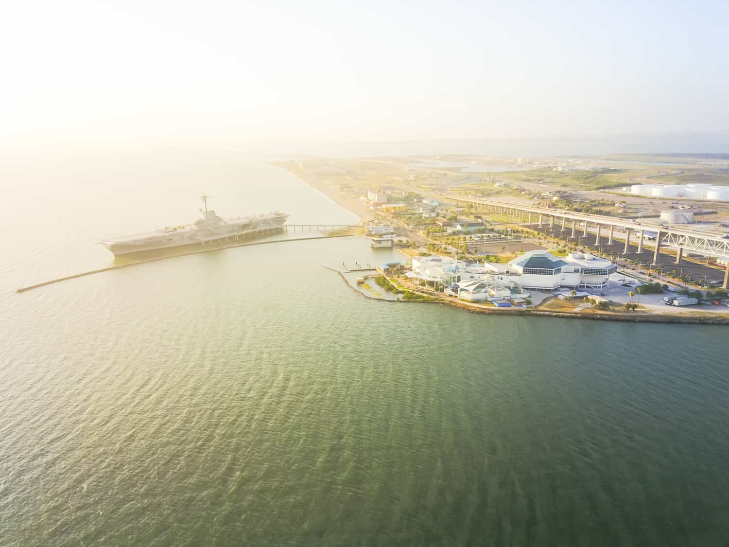 Aerial view North Beach in Corpus Christi, Texas, USA with aircraft carrier ship