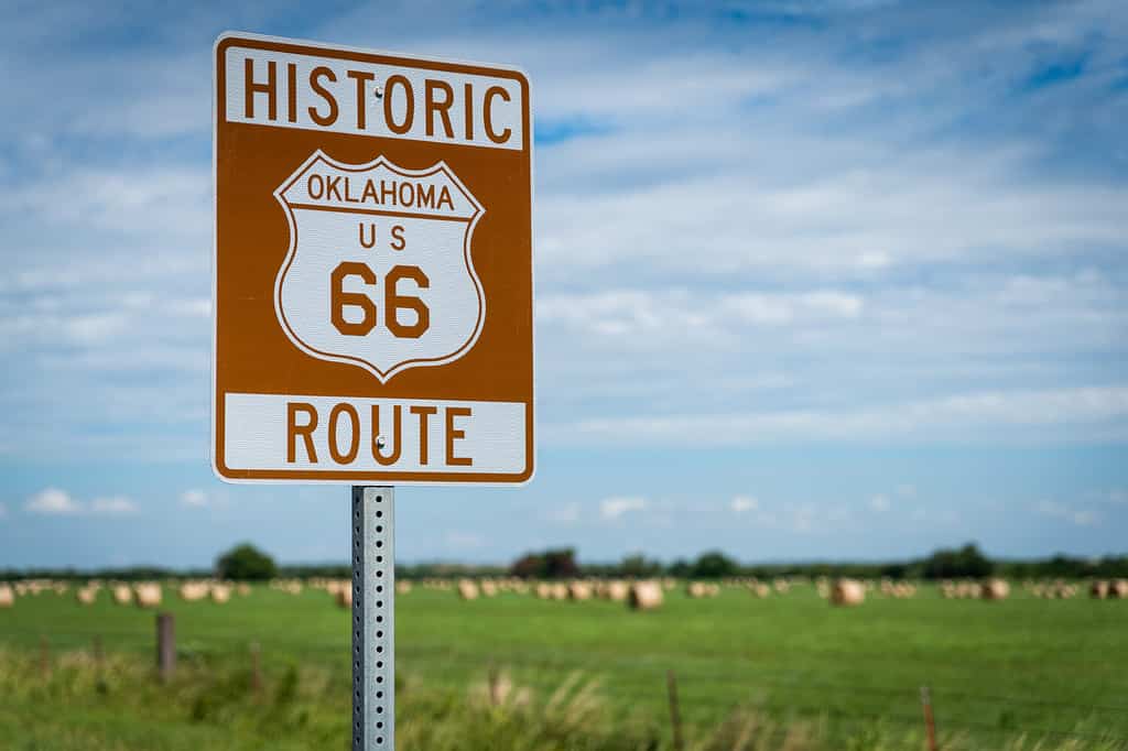 Historic brown and white sign on US Route 66 in Oklahoma