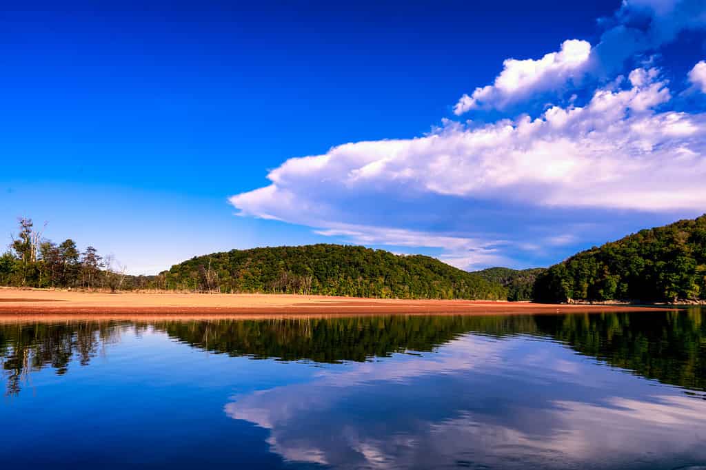 Norris Lake is a reservoir that is located in Anderson, Campbell, Claiborne, Grainger, and Union Counties in Tennessee. The lake was created by the Norris Dam at the Cove Creek Site