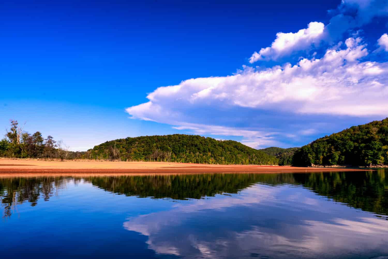 Norris Lake is a reservoir that is located in Anderson, Campbell, Claiborne, Grainger, and Union Counties in Tennessee. The lake was created by the Norris Dam at the Cove Creek Site 