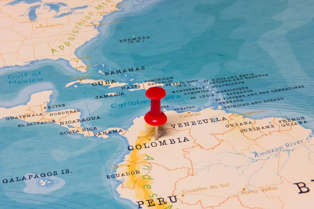 A Red Pin on Colombia of the World Map