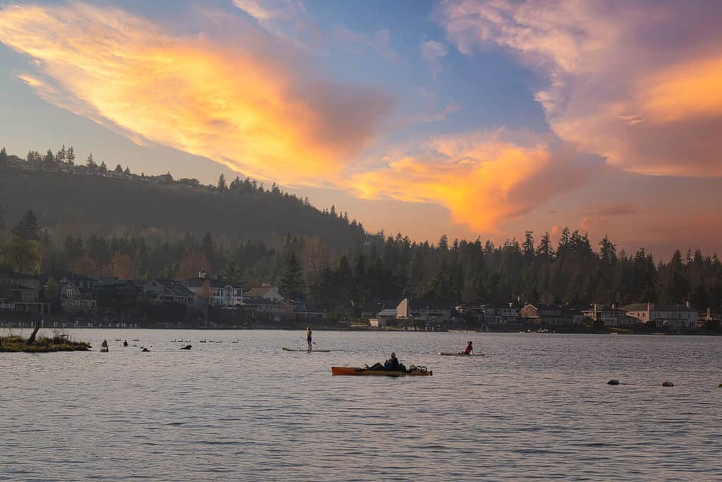 LAKE SAMMAMISH IN ISSAQUAH WASHINGTON AT SUNSET WITH A BRIGHT SUNSET