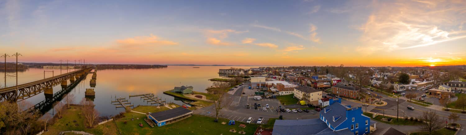 Aerial sunset panorama of Havre De Grace Harford County, Maryland, and the railroad bridge over the mouth of the Susquehanna River and the head of Chesapeake Bay one of the best American small towns