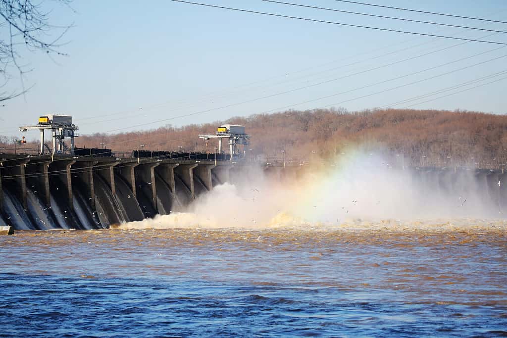 The Conowingo dam releases water and the mist reflects a rainbow