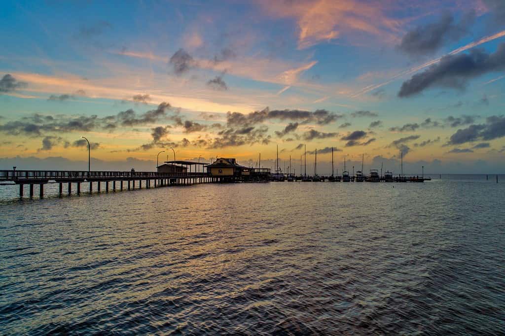 The Fairhope, Alabama municipal pier at sunset