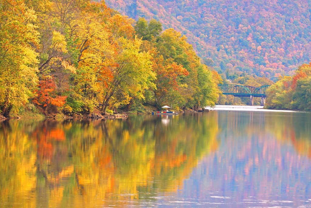 Autumn reflections in Kanawha river West Virginia