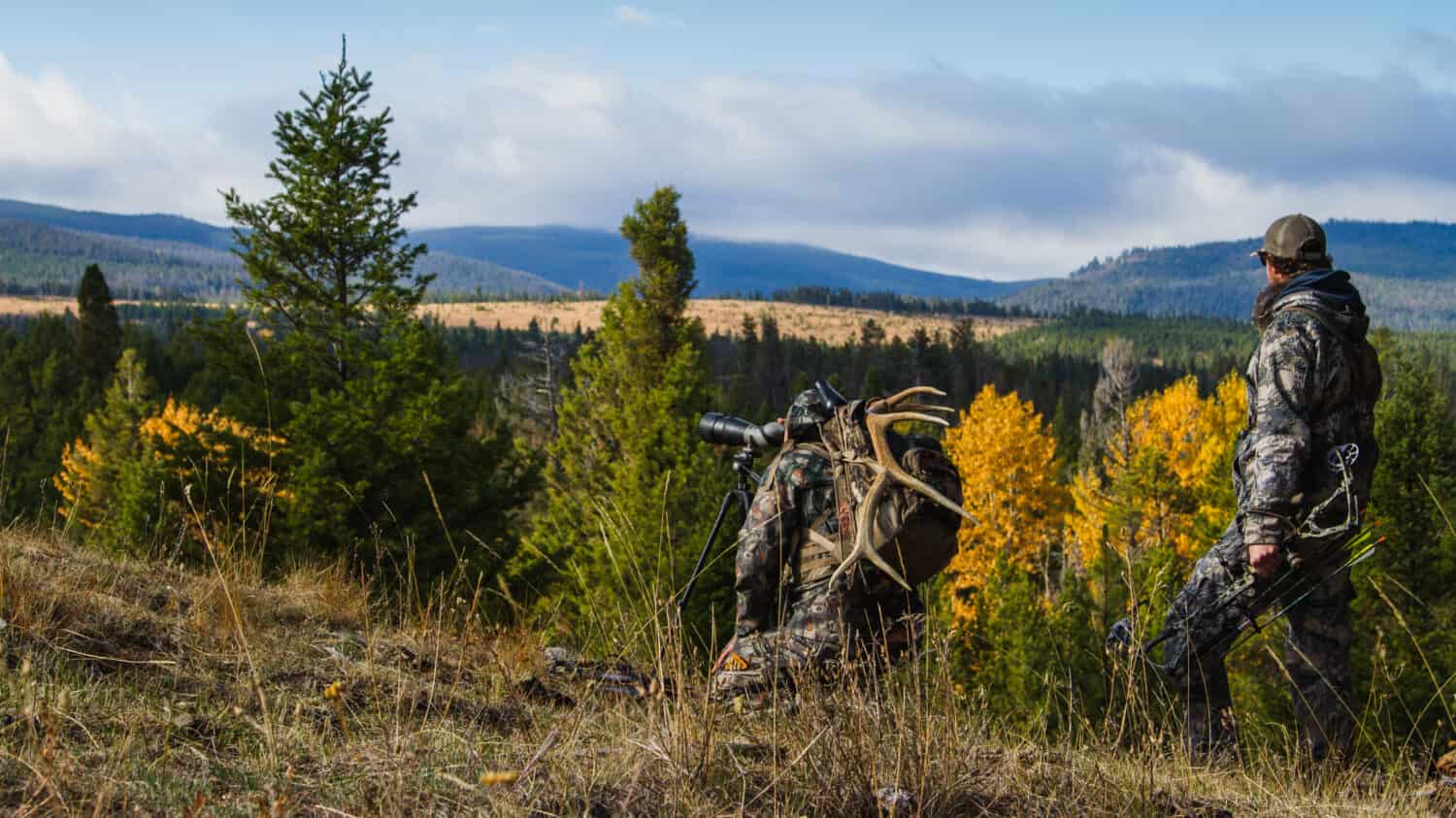 Hunters on a Mountain Ridge