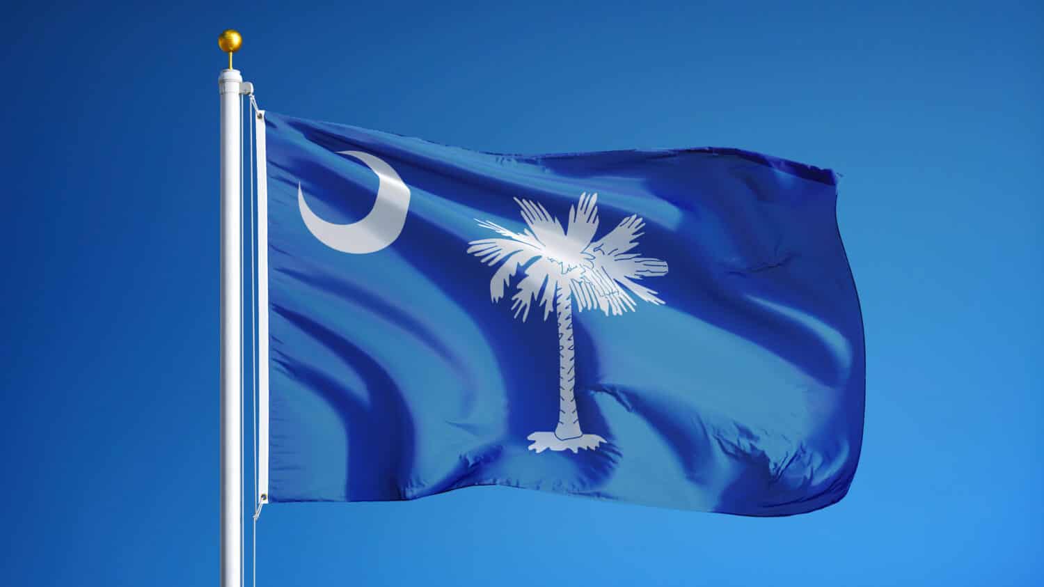 South Carolina (U.S. state) flag waving against clear blue sky, close up, isolated with clipping path mask alpha channel transparency, perfect for film, news, composition