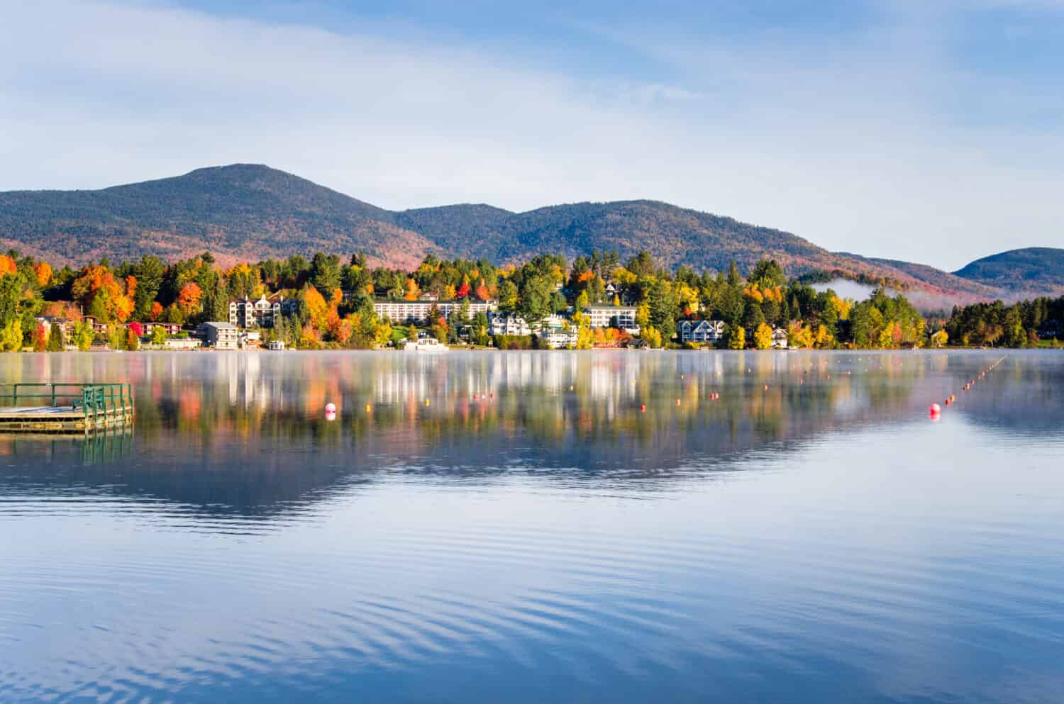 View of the Mountain Village of Lake Placid from a Foggy Mirror Lake at Sunrise