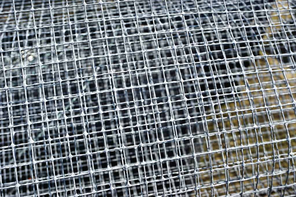 Macro of hardware cloth - metal screen with 0.25 inch grids. 