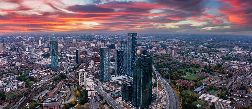 Aerial view of Manchester city at sunset.