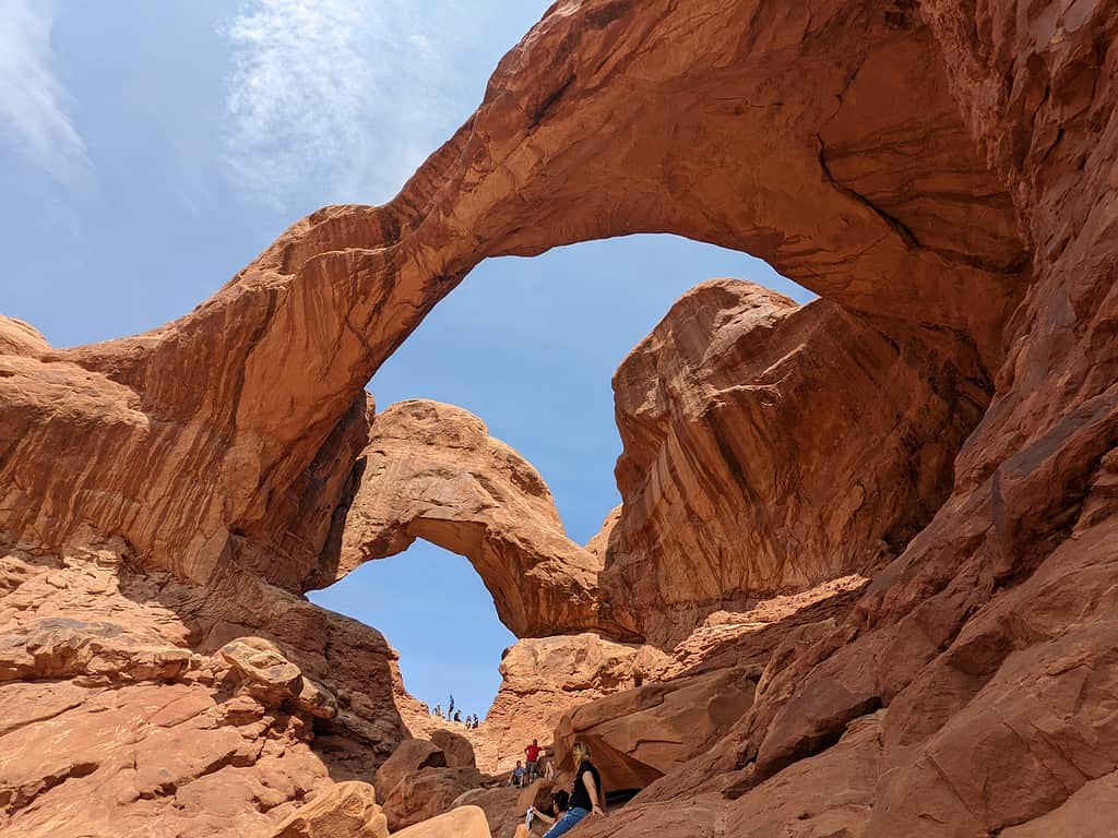 Scenic view of Double Arch red rock formation at Arches National Park in Moab, Utah. Tourist attraction.