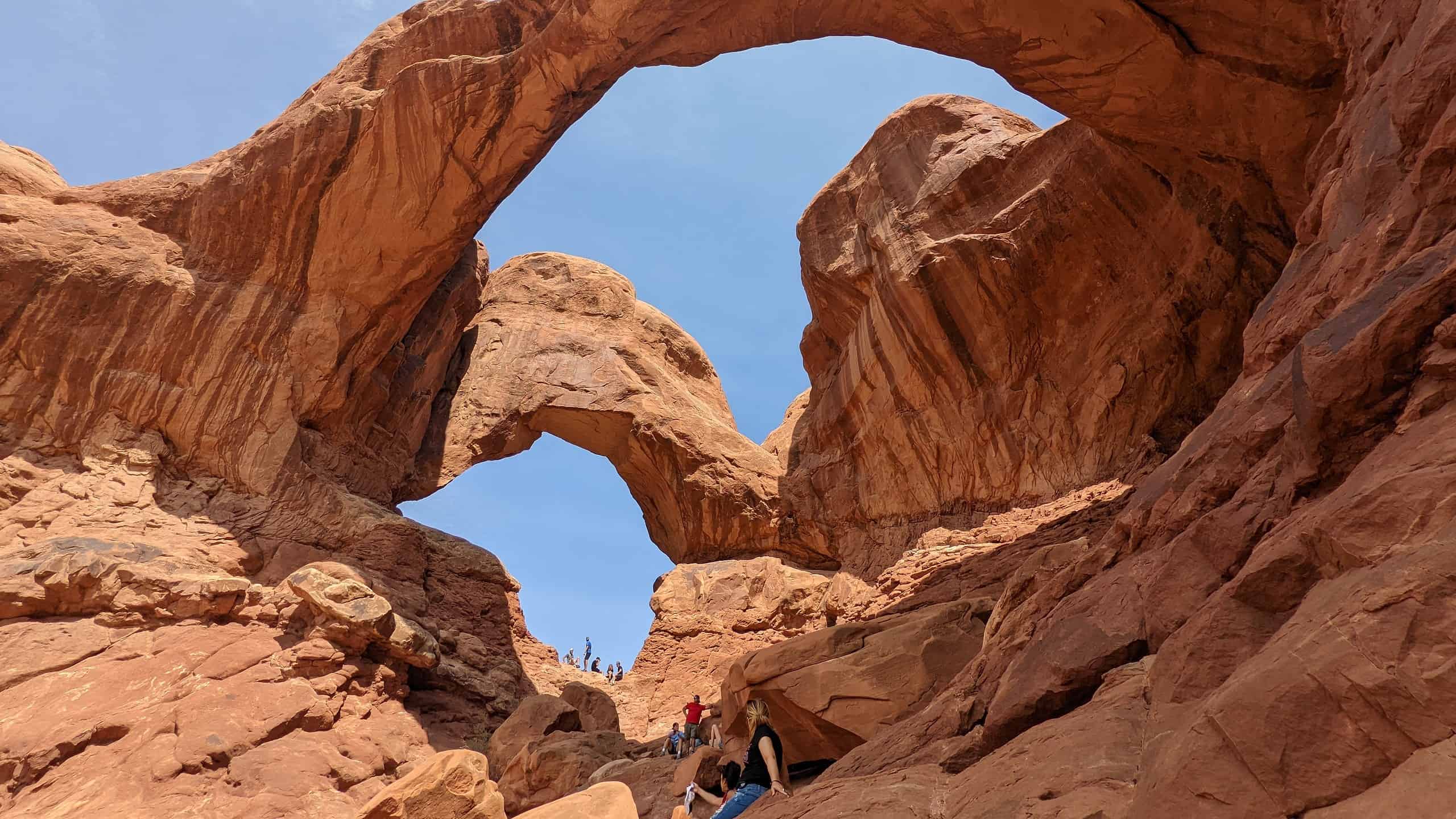 Scenic view of Double Arch red rock formation at Arches National Park in Moab, Utah. Tourist attraction.