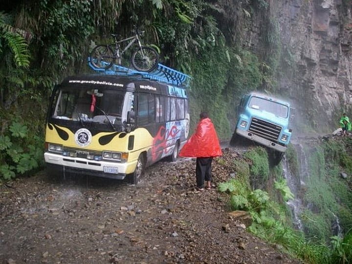 A truck on the edge of the edge of Yungas Road, Bolivia