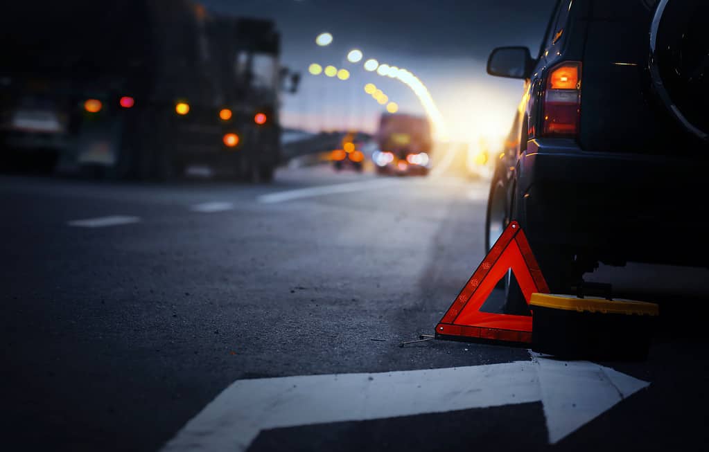 An image of a car on a road. 