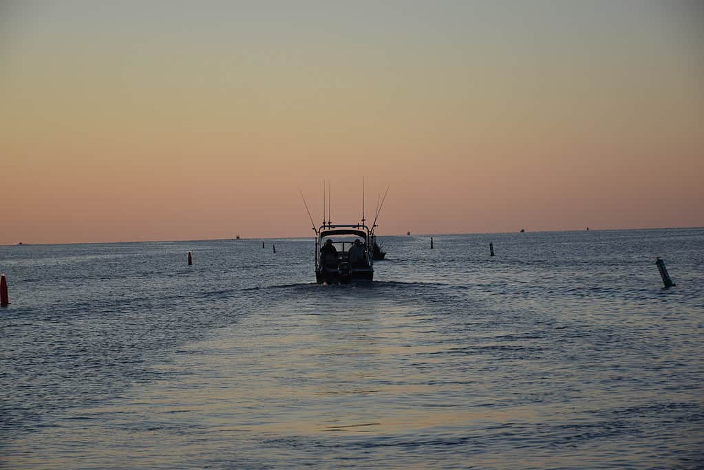 Lake Erie fishing boat heading out at sunrise