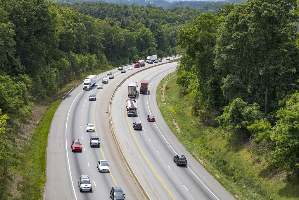 An image of cars on a highway. 