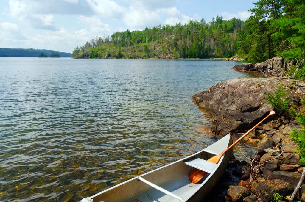  A canoe in a serene  lake 
