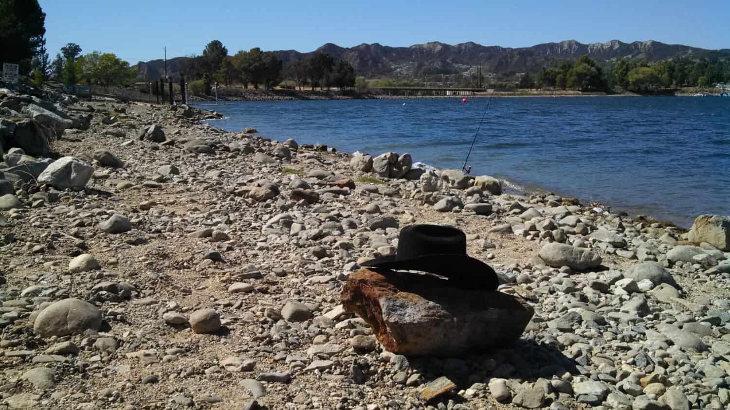 Cowboy Hat Beside the Lake