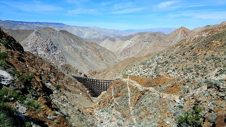 Wooden train trestle in the mountains