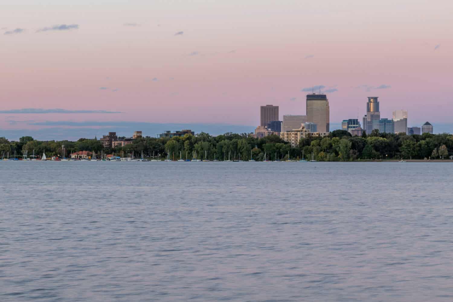 A Shot of the Minneapolis Skyline Rising Above Lake Bde Maka Ska in South Minneapolis during a Summertime Dusk