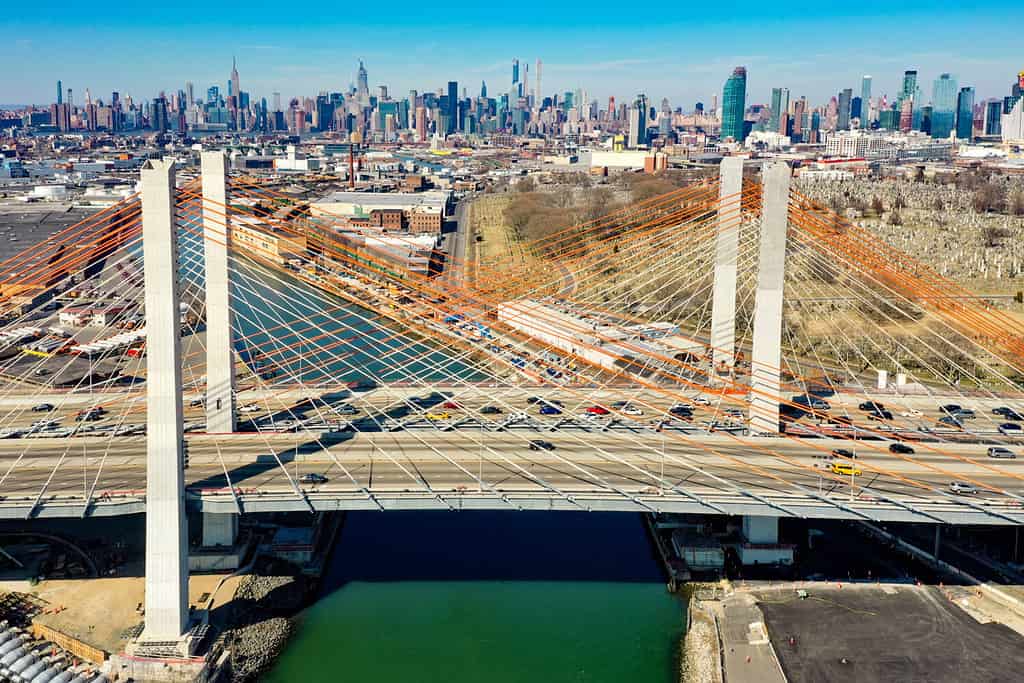 Kosciuszko Bridge joining Brooklyn and Queens in New York City across Newtown Creek. The new bridge is a cable-stayed bridge.