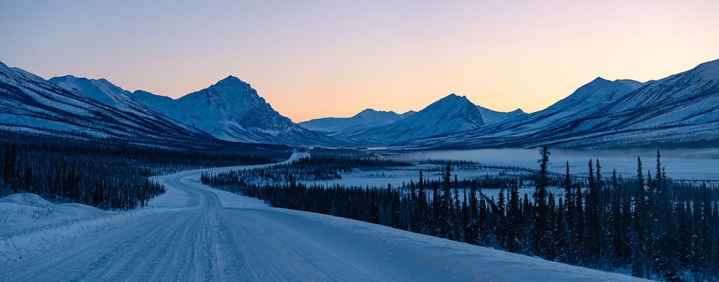 Beautiful View of the Koyukuk River Valley along the Dalton Highway in Alaska with Snow Covered Mountains During Winter