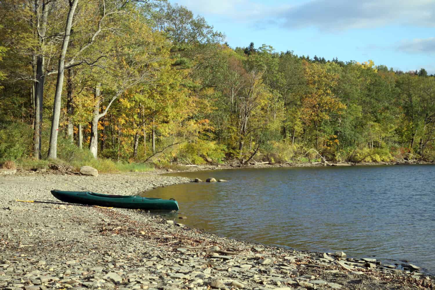 Kayak on the shore of Canadice Lake, New York, in autumn