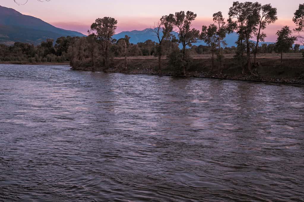 Pretty pink sunset along the Yellowstone River, Absaroka Mountain Range in the Paradise Valley in Montana