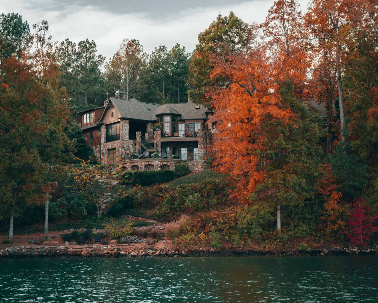 Lake Keowee Real Estate Homes: Unparalleled waterfront living in South Carolina's hidden gem, where luxurious residences seamlessly blend with the pristine beauty of the lake.