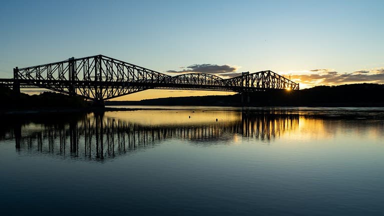 Quebec bridge on a calm summer day at sunset