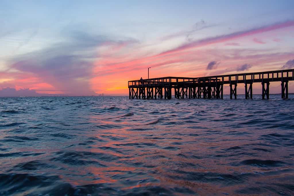 Mobile Bay pier at sunset on the Daphne, Alabama Gulf Coast