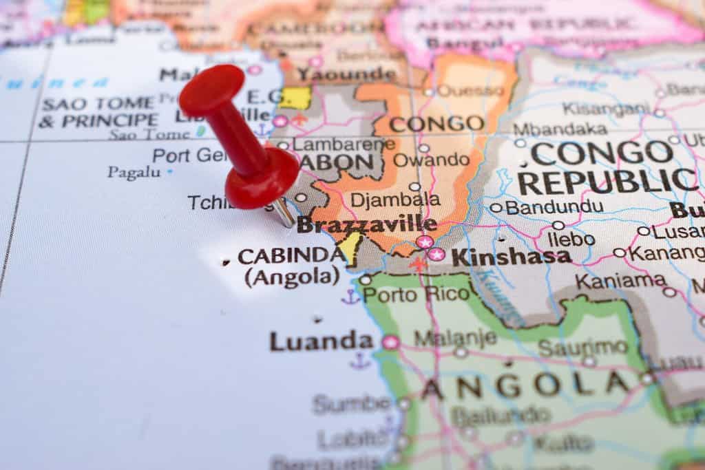 Red Push Pin Pointing on Brazzaville World Map Close-Up View Stock Photograph
